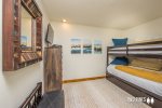 Guest bedroom with Twin over Twin bunk- Bottom Bunk Converts into a King sleeps 4